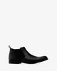 Herrenschuhe im chelsea-stil aus schwarzem leder - made in spain -