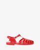 Red plastic water sandals