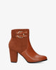 High heeled combined brown colour bootie.
