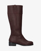 Flat high-calf boots in burgundy faux leather.