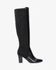 Hohe stiefel aus schwarzem lederimitat
