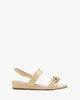Cream colored croc wedge sandals