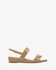 Brown colored croc wedge sandals