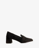 Heeled moccasin in black faux suede