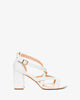 White faux leather sandals