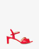 Red embossed faux leather sandals