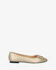 Flat ballerinas in gold faux leather