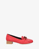 Red embossed faux leather shoes