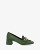 Heeled moccasin in green coloured faux suede