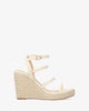 Beige soft fabric sandal with a jute wedge
