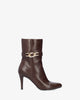 Heeled booties in soft brown faux leather