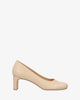 Heeled pumps in soft beige faux leather