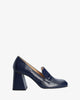 Heeled loafers in navy leather