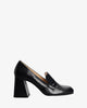 Heeled loafers in black leather