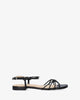 Flache sandalen aus schwarzem leder