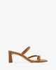 Mule en cuir noir à bout marron