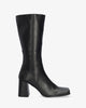 Heeled boots in black leather