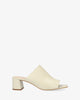 Off-white leather heeled mules