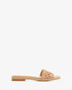 Flat sandals in beige braided leather