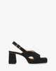 Heeled black suede sandals with platform