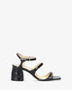 Black patent leather heeled sandals