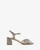 Strapped sandals in brown snake print leather