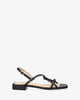 Flat black leather sandals