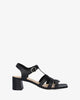 Sandale à talon noire en cuir