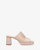 Heeled mules with platform in pink leather