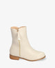 High-top booties in ivory faux leather
