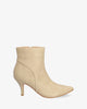 Mid-heel booties in ivory faux leather