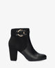 High heeled combined black colour bootie.