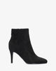 High-heeled booties in black faux suede