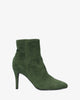 High-heeled booties in green faux suede