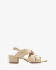 Cream colored faux leather sandals