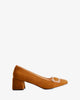 Heeled shoes in camel colored faux suede