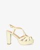 Embossed off-white faux patent sandals