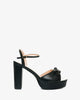 Black faux leather sandals