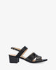 Black embossed faux leather sandals
