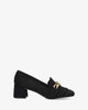 Heeled moccasin in black coloured faux suede