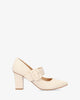 Classic pumps in off white faux leather