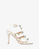 Soft white coloured hig heels sandals