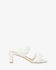 Soft white mule with a thin block heel