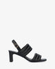 Soft black mule with a thin block heel