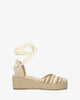 Beige fabric sandals with a jute wedge