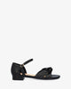 Flat sandals in soft black colored material