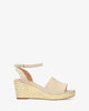 Beige faux suede sandal with a jute wedge