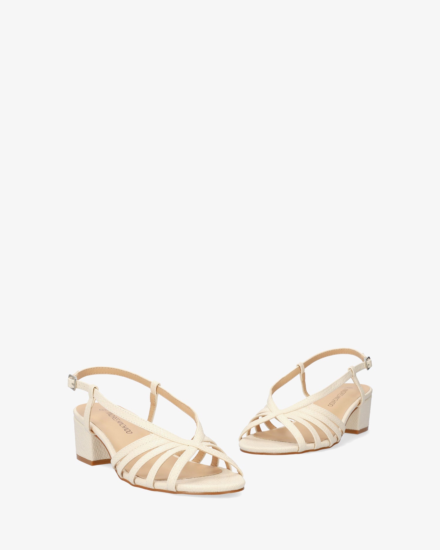 Soft ecru slingback sandal with a wide heel