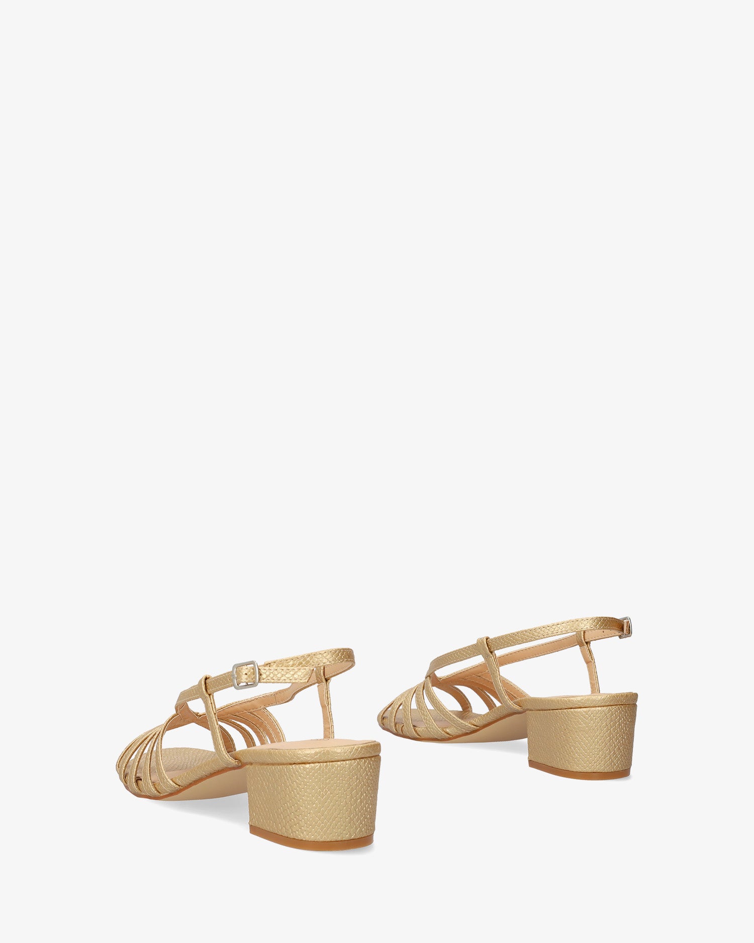 Soft gold slingback sandal with a wide heel