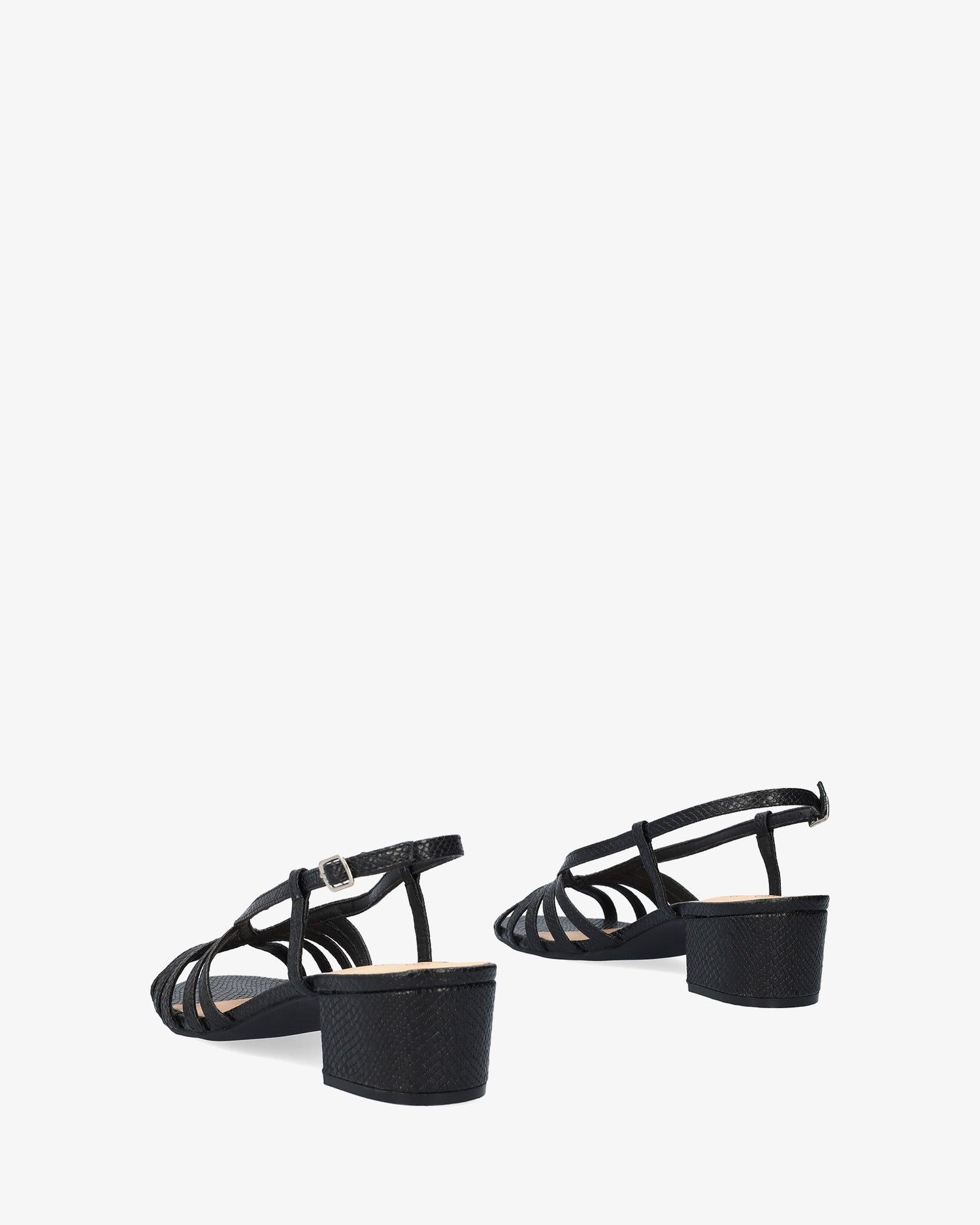 Soft black slingback sandal with a wide heel